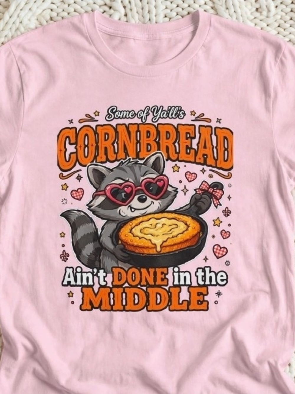Some Of Y'all's Cornbread Ain't Done In The Middle Funny Raccoon T-Shirt Pink